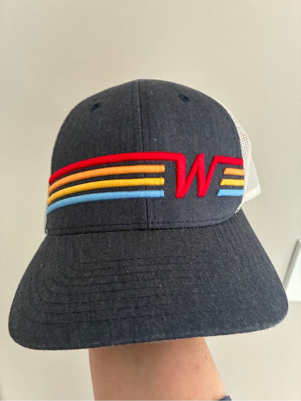 Wears Woody Trucker Hat adjustable